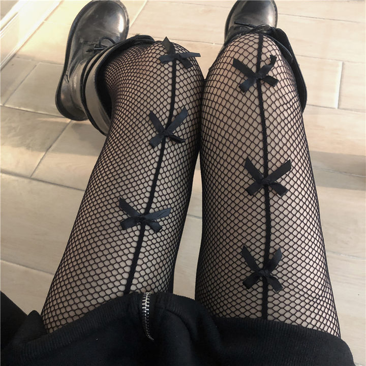 Cut-out fishnet stockings with bows